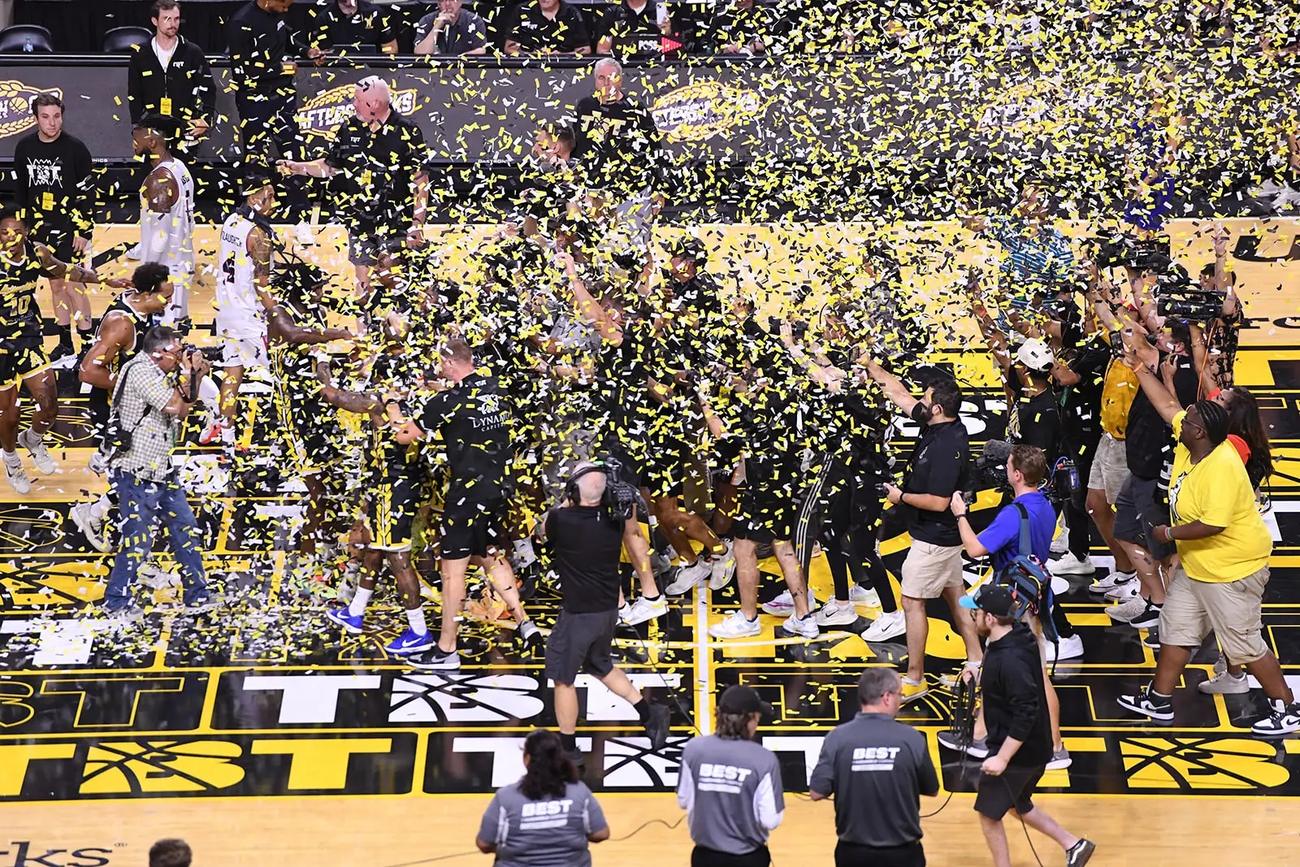 Confetti falling on the court after the 2025 championship game